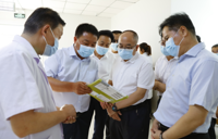 省政府参事室主任王华存参事钱耀文调研我院体制机制运行情况